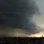 Dark storm clouds over the New York City skyline during a severe weather threat
